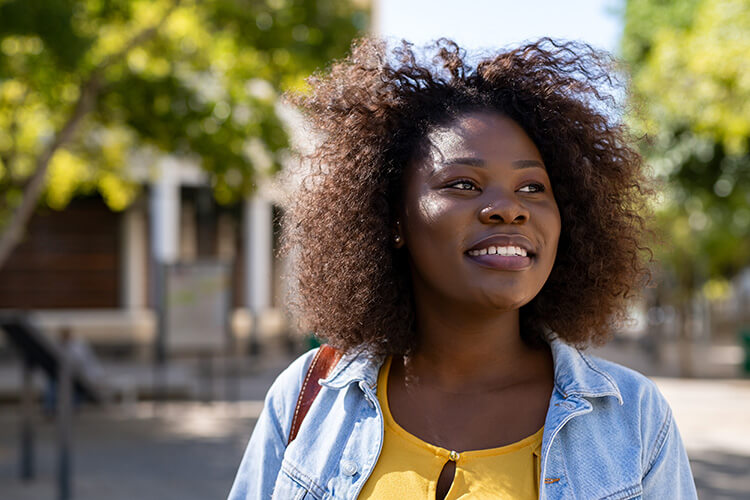 Woman smiling outside